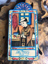 Load image into Gallery viewer, Folk Art Retablo Saint Pasqual San Pasqual Cooks Kitchens Shepherds Holy Eucharist Garlick
